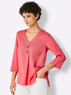 Druckbluse , am Saum hinten modisch länger