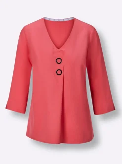 Druckbluse , am Saum hinten modisch länger