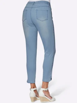7/8-Jeans mit Glitzersteinchen an den Beinschlitzen