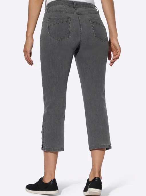 7/8-Jeans mit Zierknöpfen am Beinabschluss
