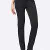 Röhrenjeans mit effektvollem Druck