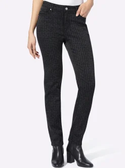 Röhrenjeans mit effektvollem Druck