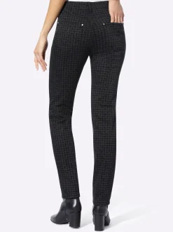 Röhrenjeans mit effektvollem Druck