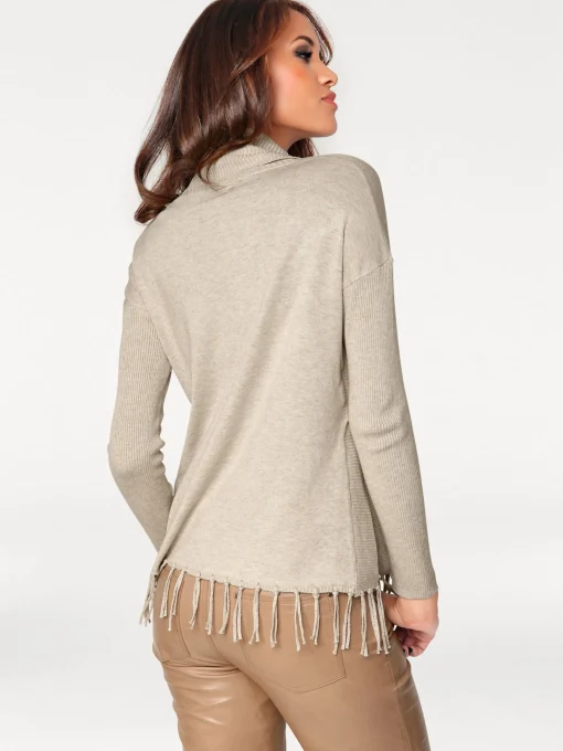 Rollkragenpullover mit Fransen