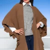 Strickponcho mit Volants